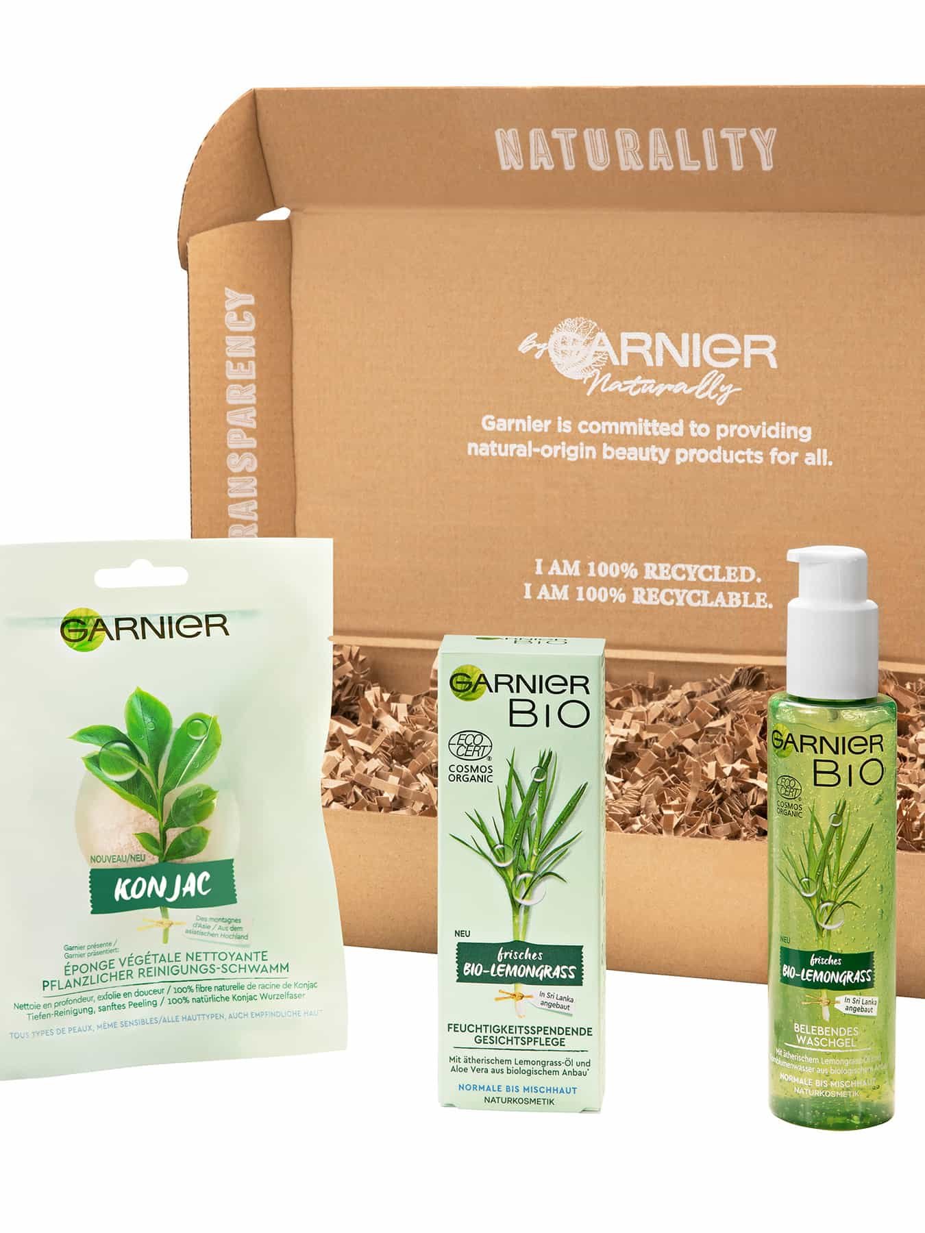 Garnier Bio Produkte vor einem mit Pappschnipseln gefüllten Karton